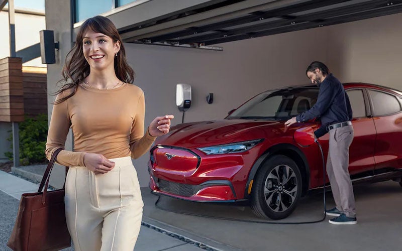 A Mustang Mach-E being charging at home